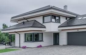 Fertiggestelltes Haus mit moderner Fassade – Bauleistungen von Helwig Bau